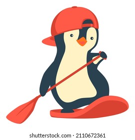 Penguin floating on SUP board. Paddle board