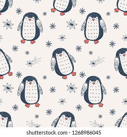 Penguin hand drawn seamless pattern. Winter background. Cartoon surface design.