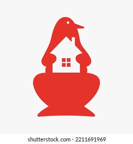 Penguin Home Logo Negative Space Concept Vector Template. Penguin Holding Home Symbol
