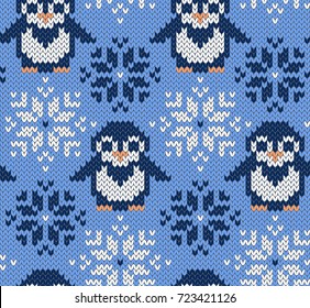 Penguin jacquard knitted seamless pattern. Winter blue background with cute animals. Northern style. Vector illustration.