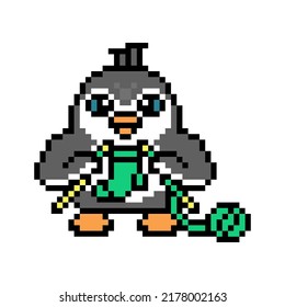 Penguin knitting a sock with two needles and a ball of yarn, pixel art animal character on white background. Retro 80s, 90s 8 bit slot machine, video game graphics. Cartoon handmade hobby mascot.