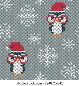 Penguin and Santa Claus hat jacquard knitted seamless pattern. Cute cartoon animal on grey snowy background. Vector illustration.