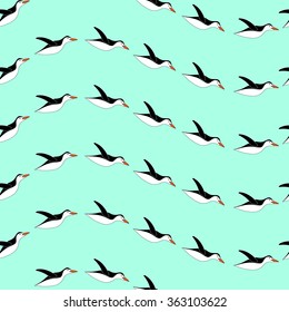 Penguin seamless pattern. The turquoise color. Penguins diving into the water. Abstract aquatic birds. Vector illustration.