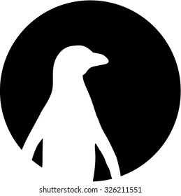 Penguin silhouette in front of the moon