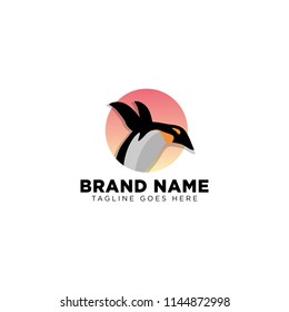 penguin sunset / jump penguin logo template vector illustration