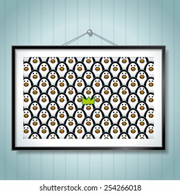 Penguin wearing Green Party Hat in large Group Photo of Penguins in Picture Frame Hanging on Blue Wallpaper Background