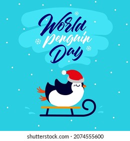 penguin wearing a Santa Claus hat is riding a winter sleigh. Banner with the inscription World Penguin Day 