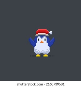 pingüino con sombrero Santa en forma de píxel