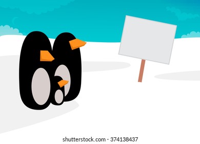 Penguins looking a blank sign