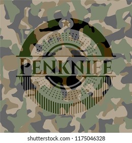 Penknife on camouflaged texture