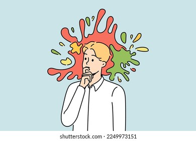 Pensive young male employee or worker with colorful splashes in head. Thoughtful businessman engaged in creative thinking. Vector illustration. 