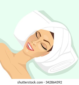 people, beauty, spa, healthy lifestyle and relaxation concept - close up of beautiful young woman lying with closed eyes in spa