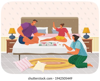 People with board game spend time in bedroom. Joyful man and women sit together at home at couch
