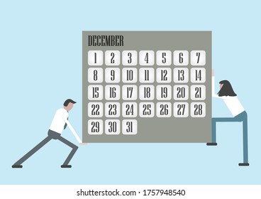 People carry a big calendar on December 