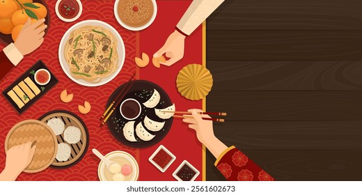 People celebrating Chinese New Year together, they are eating traditional food, top view