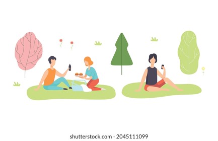 People Character Enjoying Picnic in Nature Sitting on Grass Eating and Drinking Vector Set