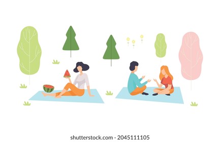People Character Enjoying Picnic in Nature Sitting on Blanket Talking and Eating Watermelon Vector Set