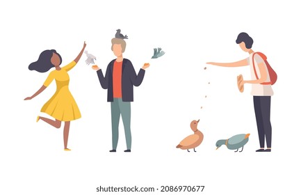 People Character Feeding Birds with Crumbs Walking in the Park Vector Set