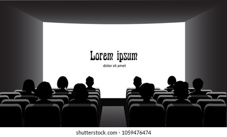 People in the cinema on the background of the screen.