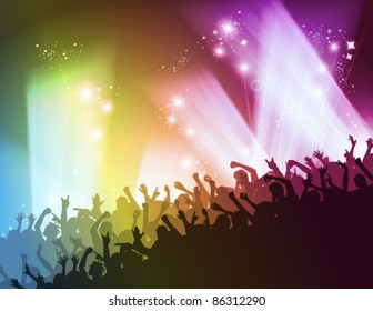 people dancing in the club under rainbow light