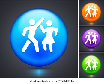 People Dancing on Blue Round Button