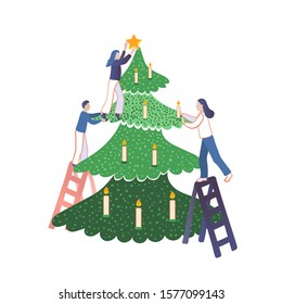 People decorate christmas tree with candles and star. Teamwork, colleagues or friends have fun together. Girl and boy standing on ladders. Man and woman help each other. Isolated on white background. 