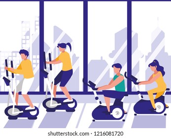 people doing spinning in gym