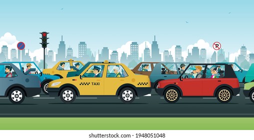 People drive cars on the streets with traffic in the city.