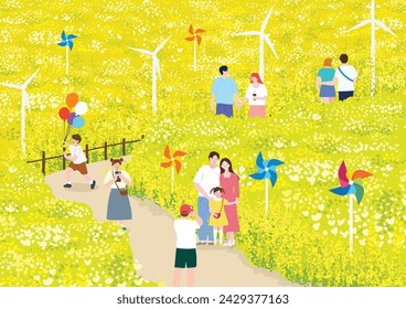 People enjoying a festival and a walk in a wide field of yellow rape flowers