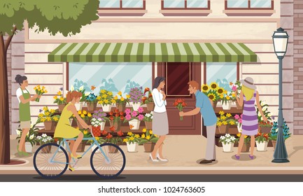 People in front of a colorful flower shop.