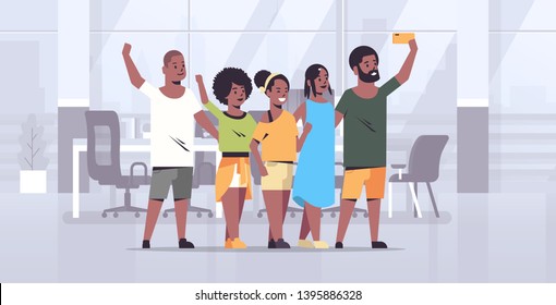 people group taking selfie photo on smartphone camera african american colleagues standing together modern office interior full length horizontal