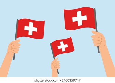 People hands raising flags of Switzerland. Vector illustration of Swiss flags in flat style on blue background.