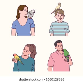 People have parrots on their shoulders, heads and hands. hand drawn style vector design illustrations. 