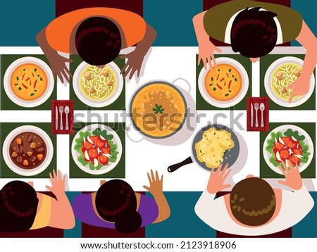 people having dinner on communal table