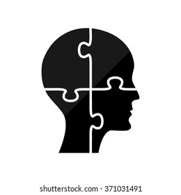People head with puzzles elements -  black vector icon