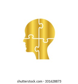 People head with puzzles elements - gold vector icon