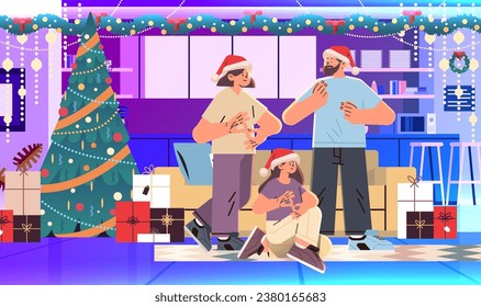 people with hearing aid disabled deaf mute family in santa claus hats communicate using sign language hearing disability merry christmas holidays celebration