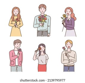 La gente está sosteniendo flores. ilustración vectorial de estilo de diseño plano.