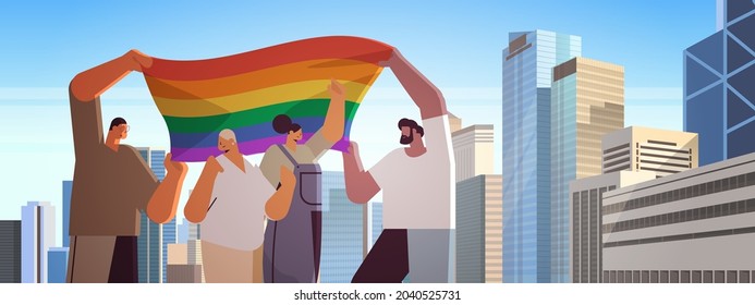 people with lgbt rainbow flag walking on city street gay lesbian love parade pride festival transgender love