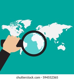 people looking for a place on the map through a magnifying glass