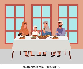 People in national costumes are eating kosher food outside. Arab family is sitting against the background of a building with windows. Arab family sitting at festive table and celebrating the holiday