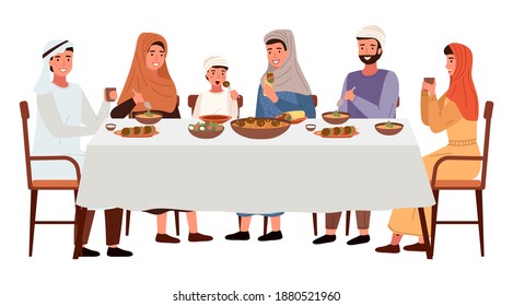 People in national costumes are eating kosher food outside. Arab family is sitting. Arab family sitting at festive table and celebrating the holiday. Muslim family gathering around dining table