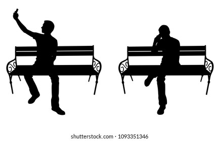 people on bench with phone