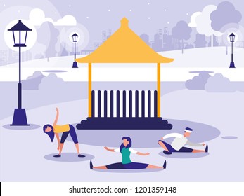 people performing stretching in park with kiosk