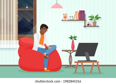 People play video game at home vector illustration. Cartoon guy character with gamepad controller sitting in armchair of living room interior, young man gamer playing, digital entertainment background