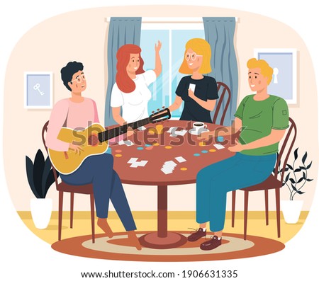 People playing board game. Man sings songs. Guy playing guitar. Friends have fun at home. Girls discuss card game on table. Entertainment and pastime in apartment. Musician uses strings on instrument