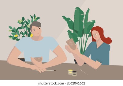 People in the pottery workshop for design