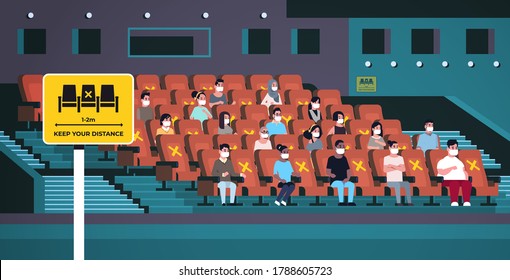 people in protective masks watching movie keeping distance to prevent coronavirus social distancing concept mix race men women sitting through one chair cinema hall interior horizontal full length