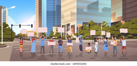 people protesters holding blank placards men women activists with empty banners on asphalt road protest demonstration strike concept modern city street cityscape background full length horizontal