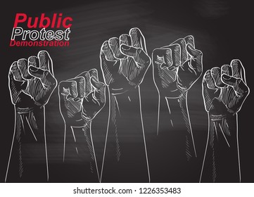 People raised hands fist air fighting for their rights and shouting.Concept of revolution or protest. Crowd of protesters people. 